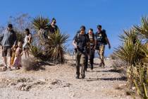Tourists hike along the scenic route at the Red Rock Canyon National Conservation, on Monday, F ...
