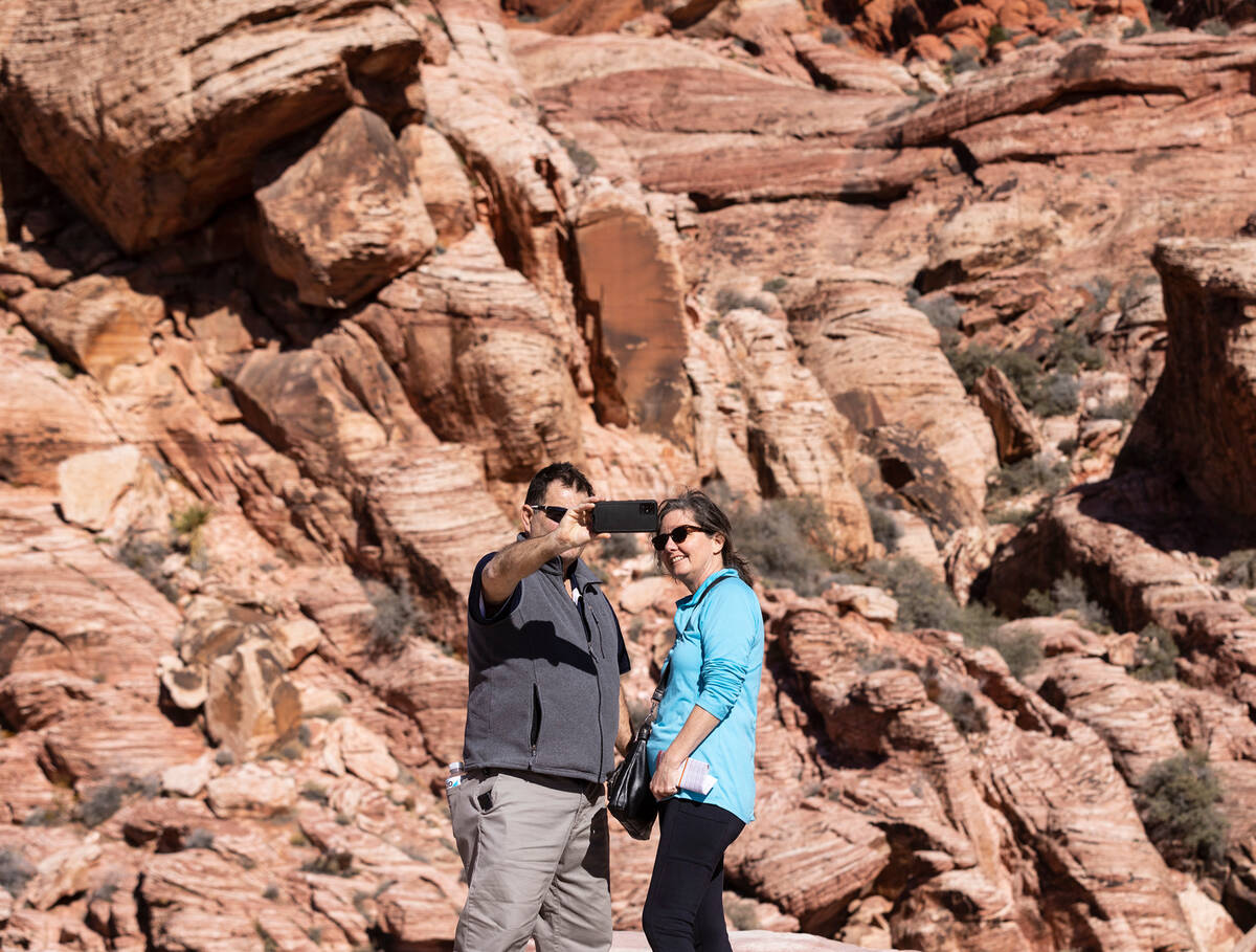 Glenn McDonald takes a selfie with his wife Marian, both of Boston, as they visit the Red Rock ...