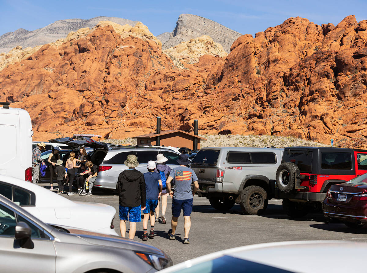 Tourists park their cars at the Calico 1 stop along the scenic route to visit the Red Rock Cany ...
