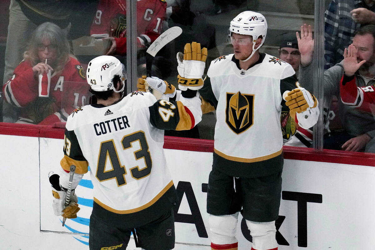 Vegas Golden Knights center Jack Eichel, right, celebrates with center Paul Cotter after scorin ...