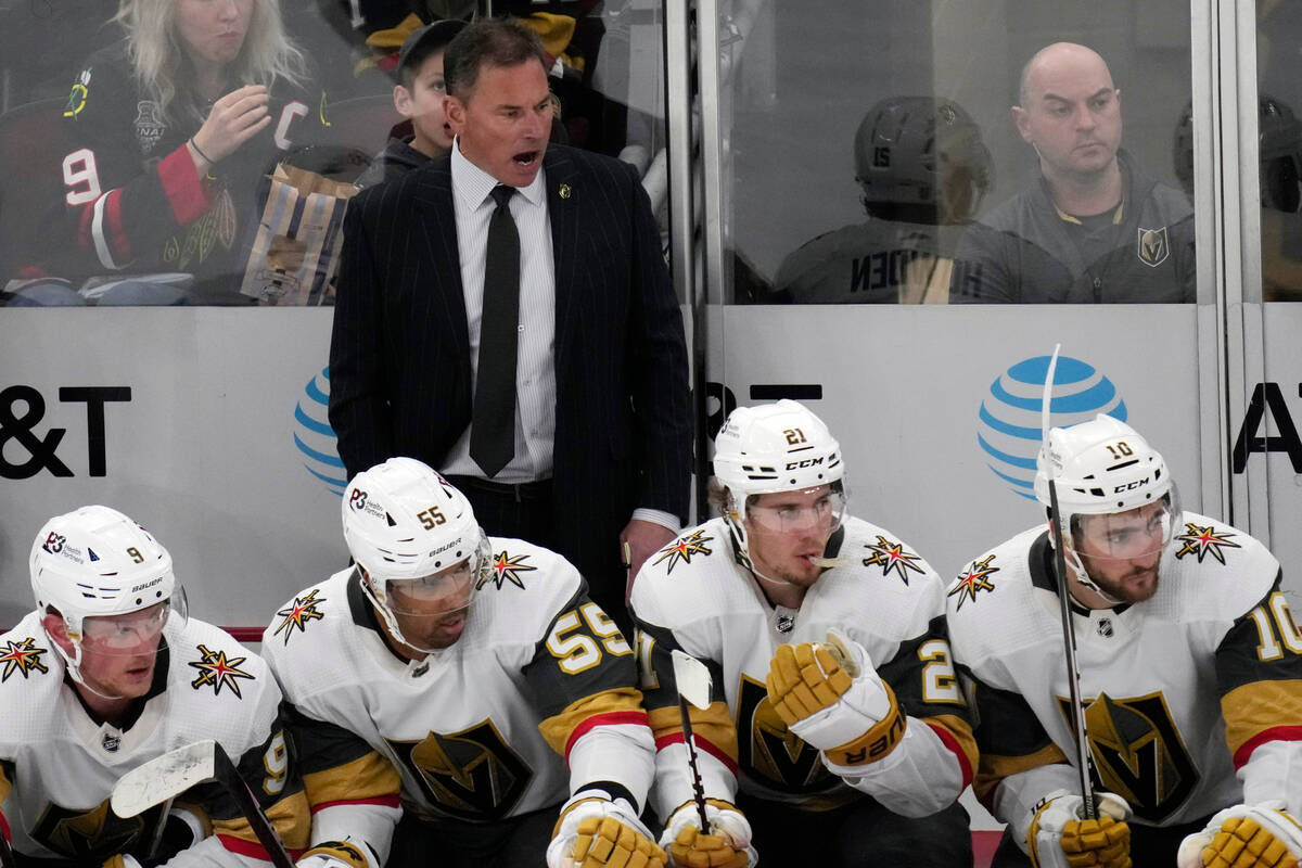 Vegas Golden Knights head coach Bruce Cassidy talks to his team during the second period of an ...