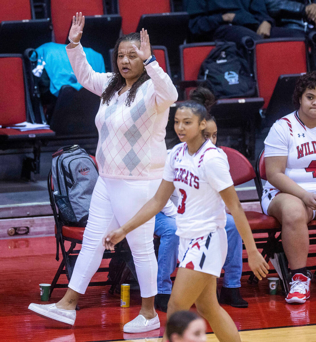 Las Vegas' Head Coach La Shondra Rayford counsels her players against Arbor View during the fir ...
