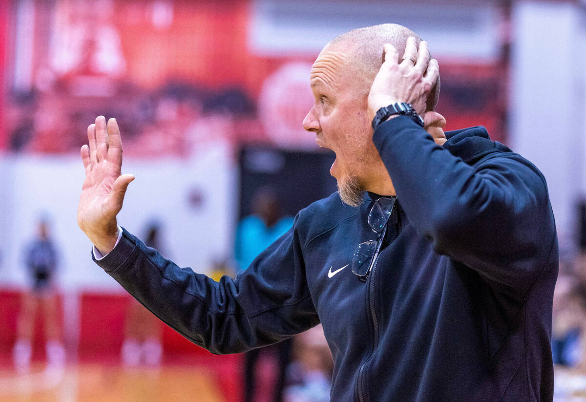 Las Vegas Head Coach Jason Wilson counsels a player against Silverado during the first half of ...
