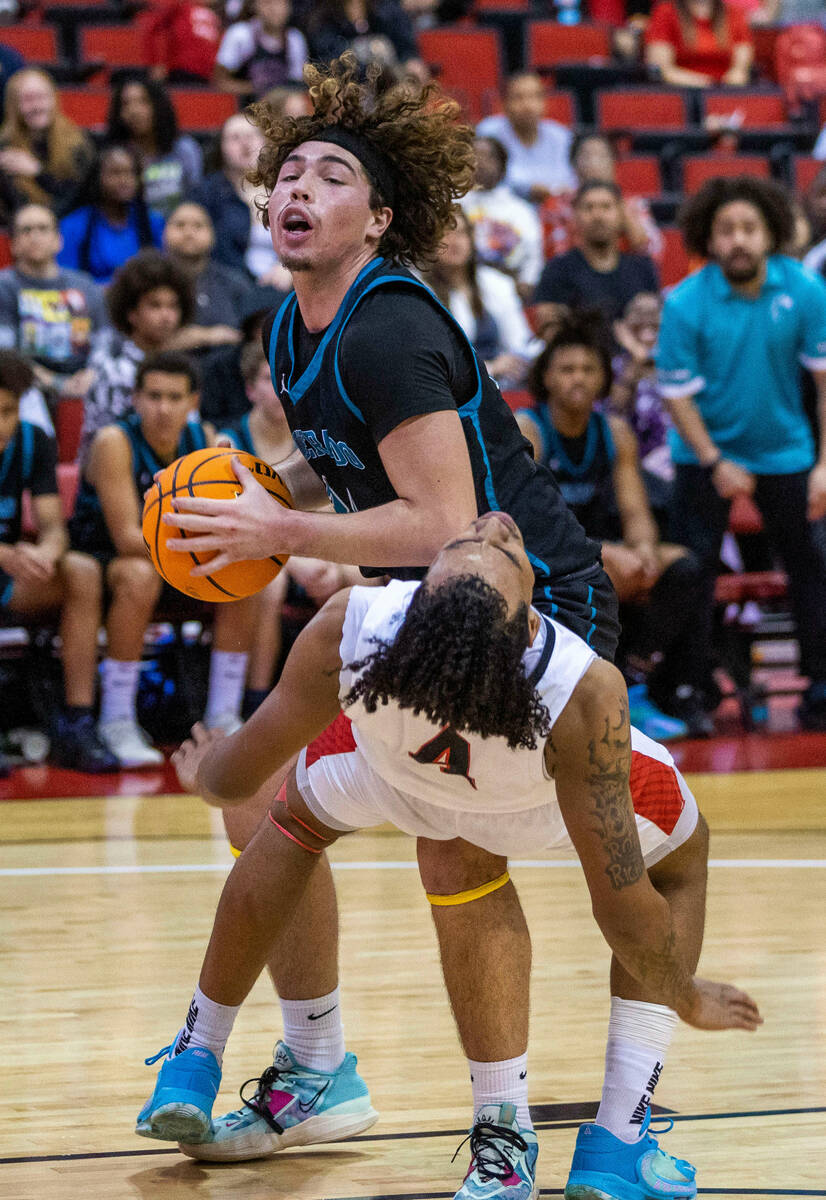 Silverado's Mike Andersen (24) drives a charge into Las Vegas' Marcus Gomez (4) during the seco ...
