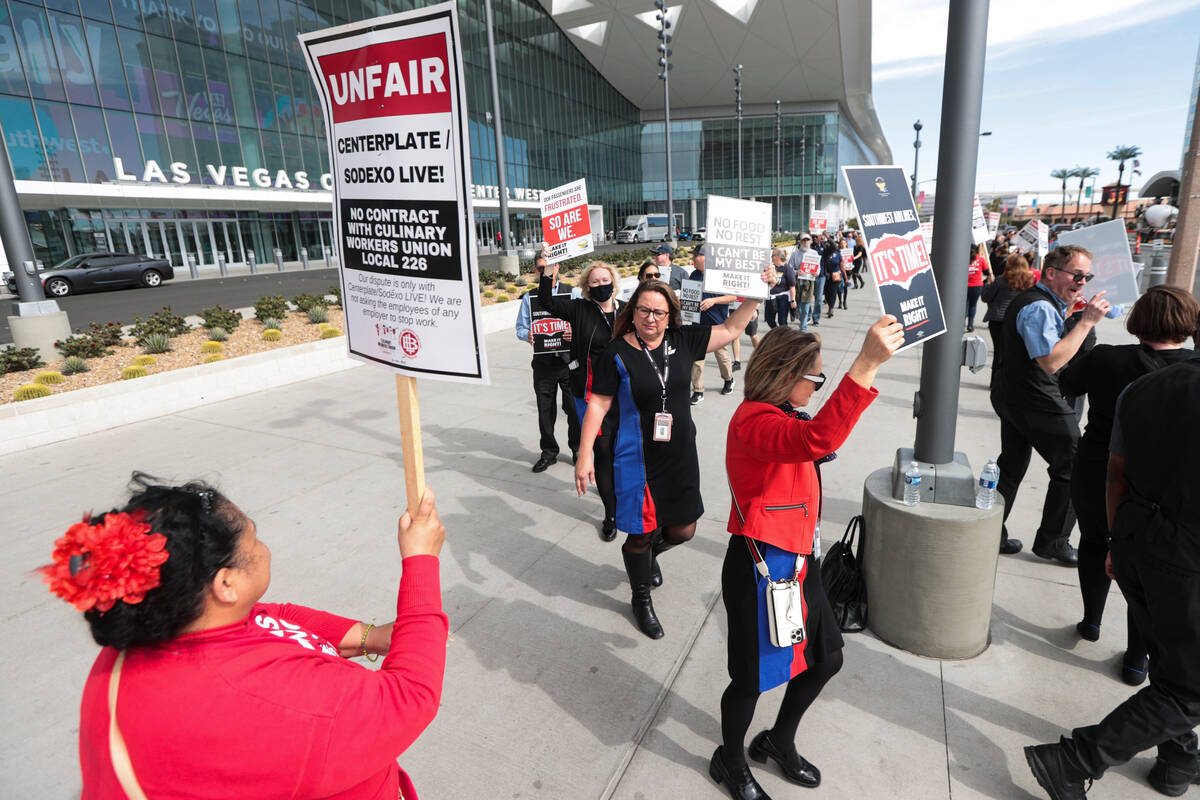 Members of Transport Workers Union Local 556, the union of Southwest Airlines flight attendants ...