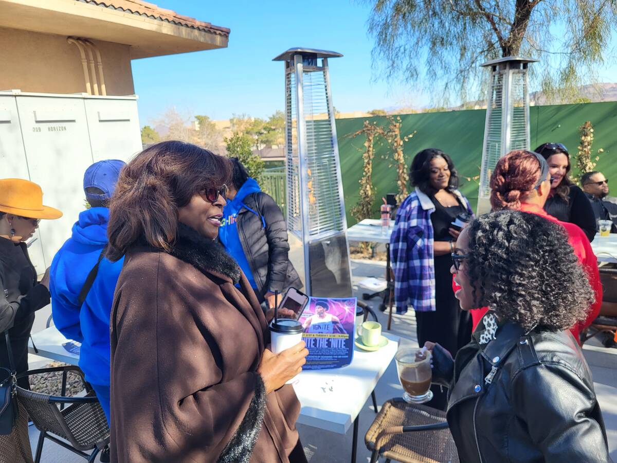 Debbee Jeter (left) talks to Nicci Willis (right) outside of The Coffee Class in Henderson. (Ma ...