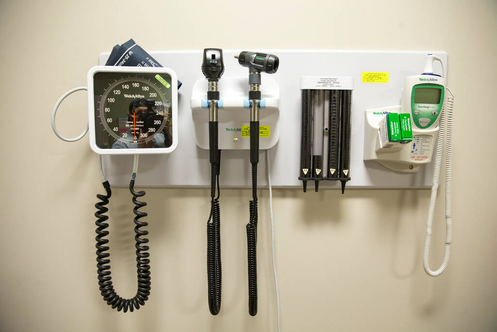 Medical instruments hang in an examination room at myGeneration, a senior-focused health clinic ...