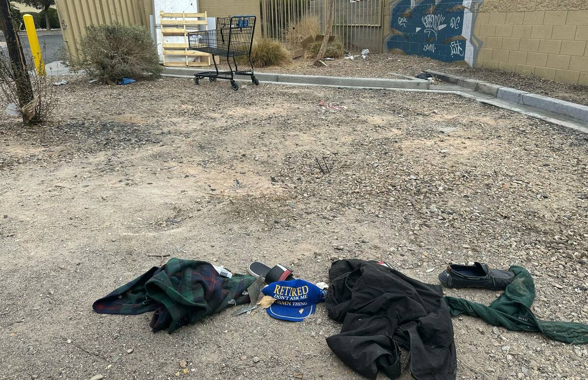The scene behind an AutoZone at South Nellis Boulevard and East Desert Inn Road. A man and woma ...