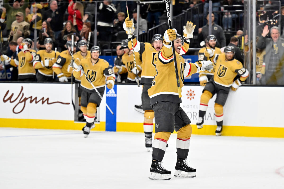 Vegas Golden Knights right wing Jonathan Marchessault (81) and the bench celebrate the winning ...