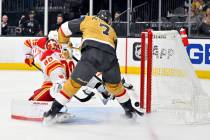 Vegas Golden Knights defenseman Alex Pietrangelo (7) scores against Calgary Flames goaltender D ...
