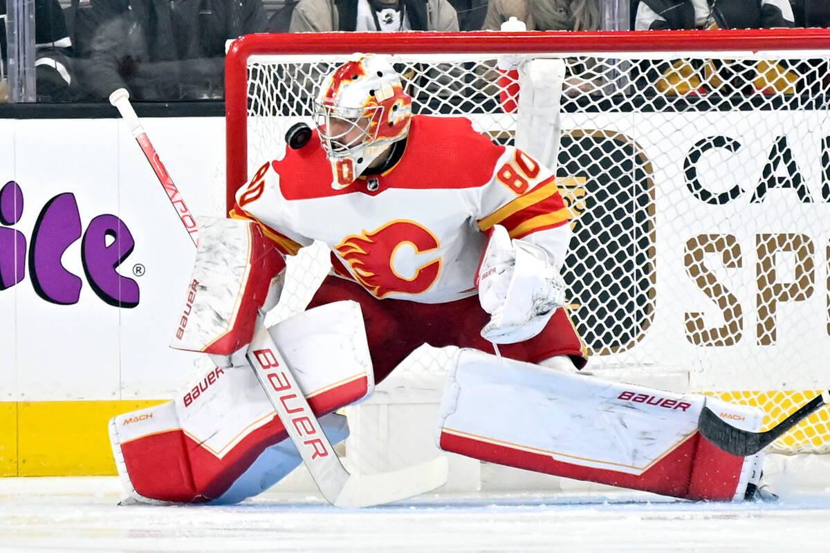 Calgary Flames goaltender Dan Vladar defends the net against the Vegas Golden Knights during th ...