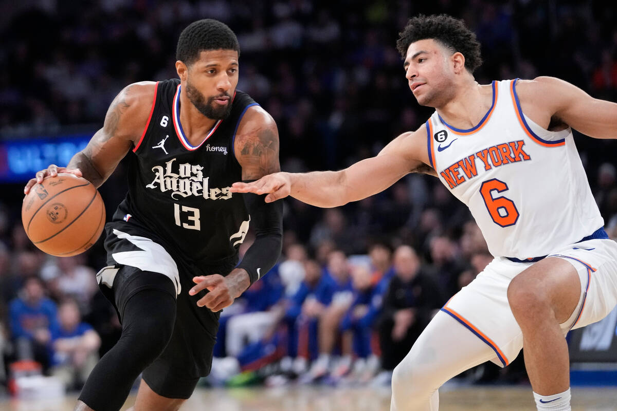 Los Angeles Clippers guard Paul George (13) drives against New York Knicks guard Quentin Grimes ...