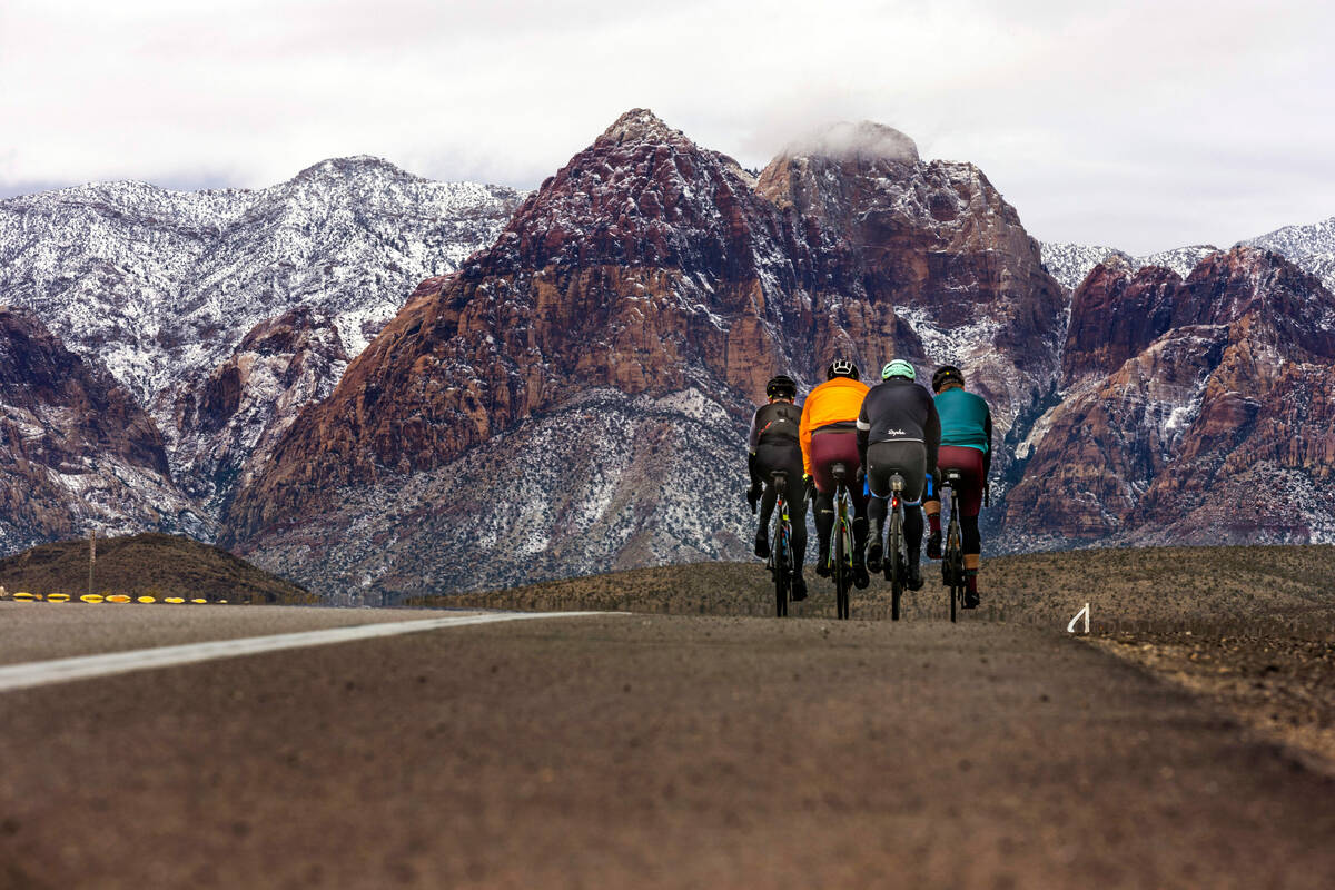 Cyclists make their way along SR 159 about the Red Rock Canyon National Conservation Area where ...
