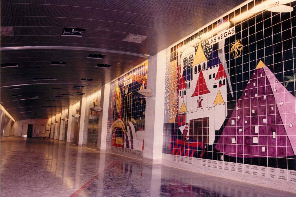 Murals of national and international city skylines developed by local school students are on pe ...