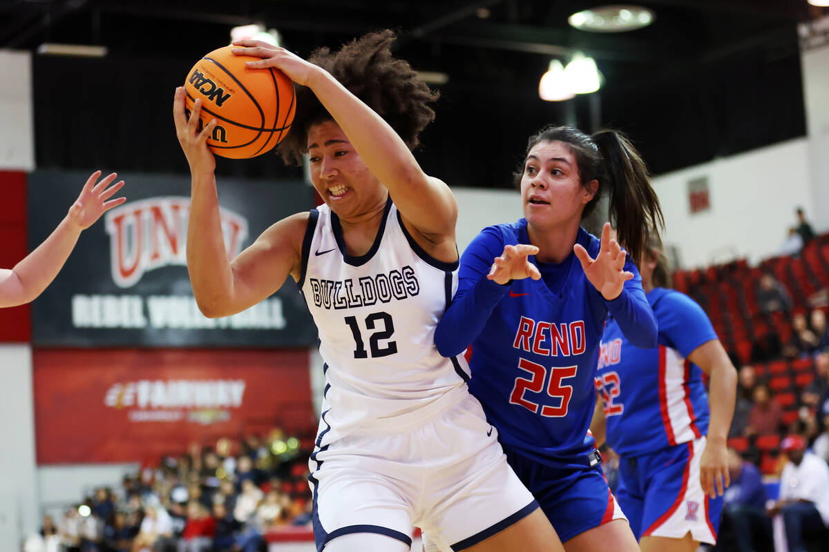Centennial's Ayla Williams (12) fights for the ball against Reno's Adia Walker (25) during a gi ...