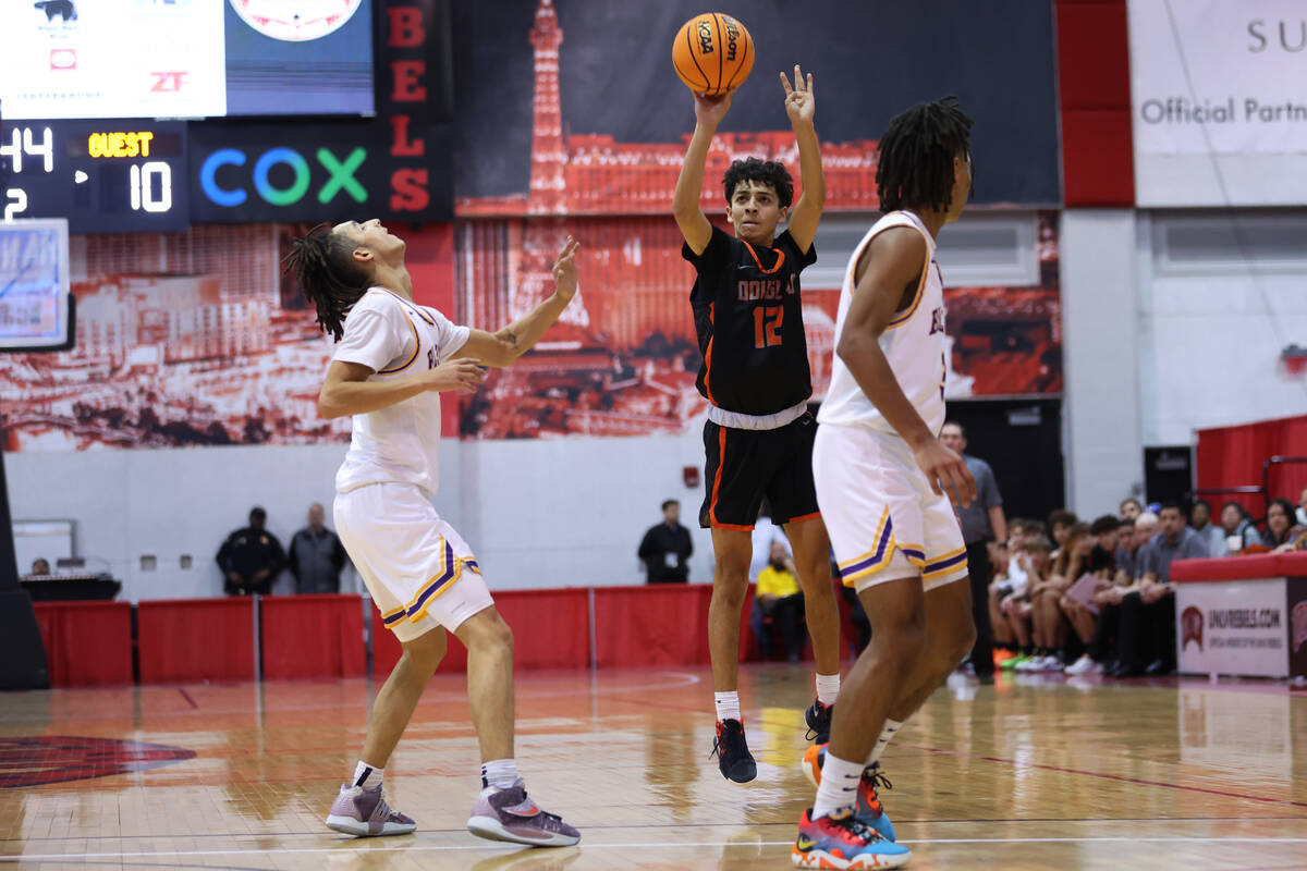 Douglas' Jeremiah Pitts (12) takes a shot during a boys class 5A state semifinal game against D ...