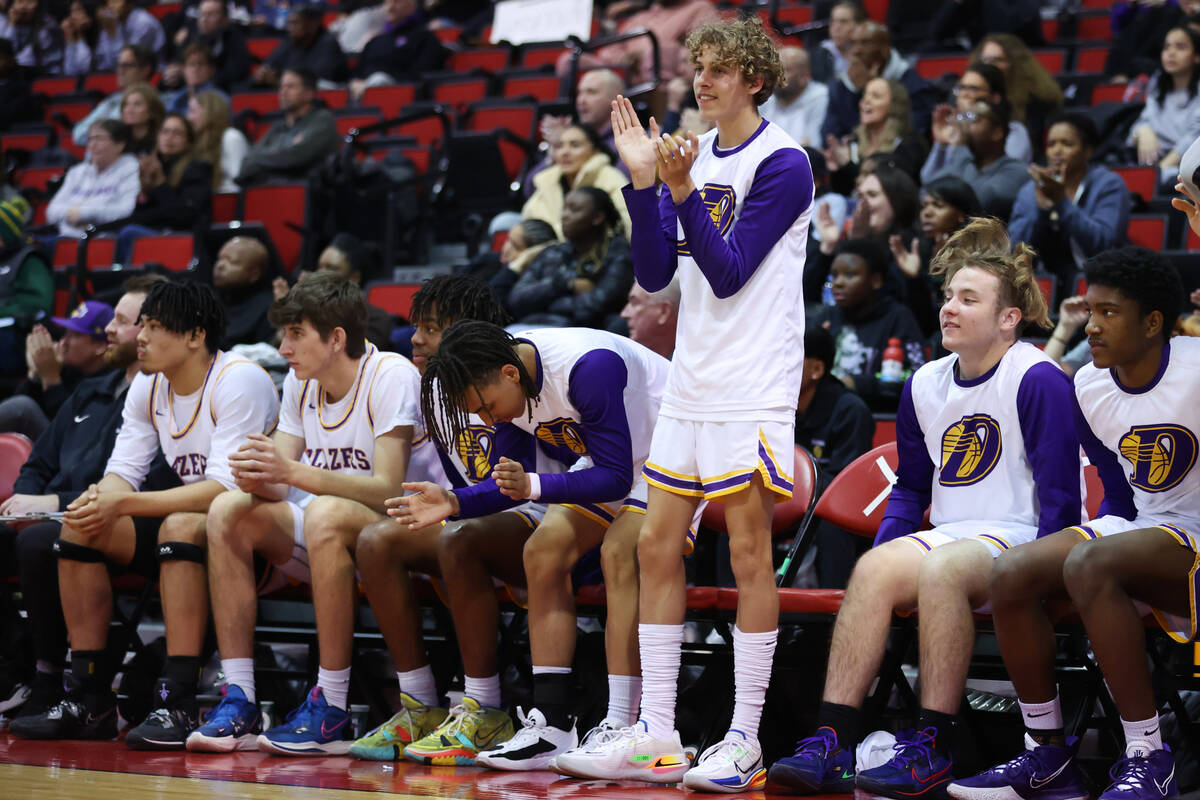 The Durango bench reacts after a play during a boys class 5A state semifinal game against Dougl ...