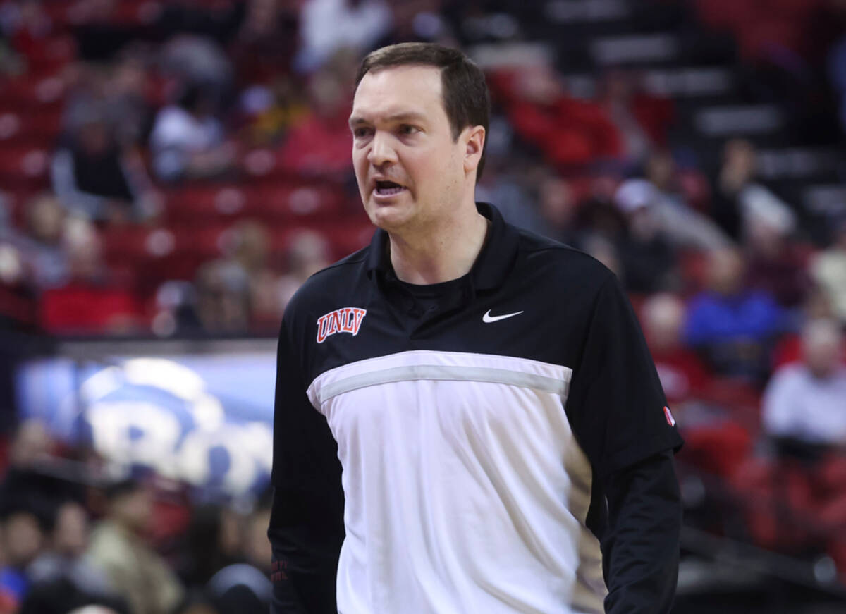 UNLV head coach Kevin Kruger talks toward the bench during the second half of a basketball game ...