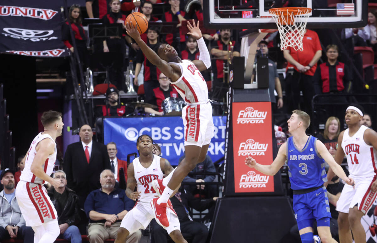 UNLV forward Victor Iwuakor (0) grabs a rebound against Air Force during the second half of a b ...
