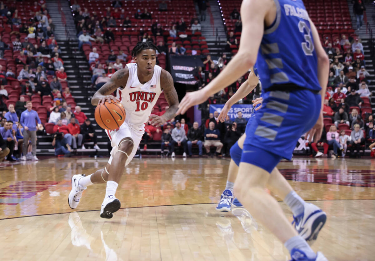 UNLV guard Keshon Gilbert (10) drives to the basket against the Air Force Falcons during the se ...