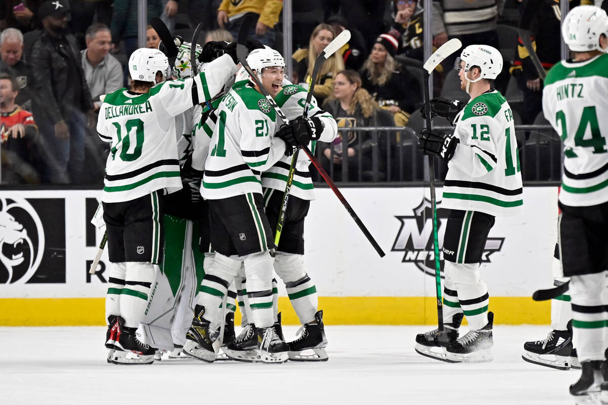 The Dallas Stars celebrate an overtime win against the Vegas Golden Knights in an NHL hockey ga ...