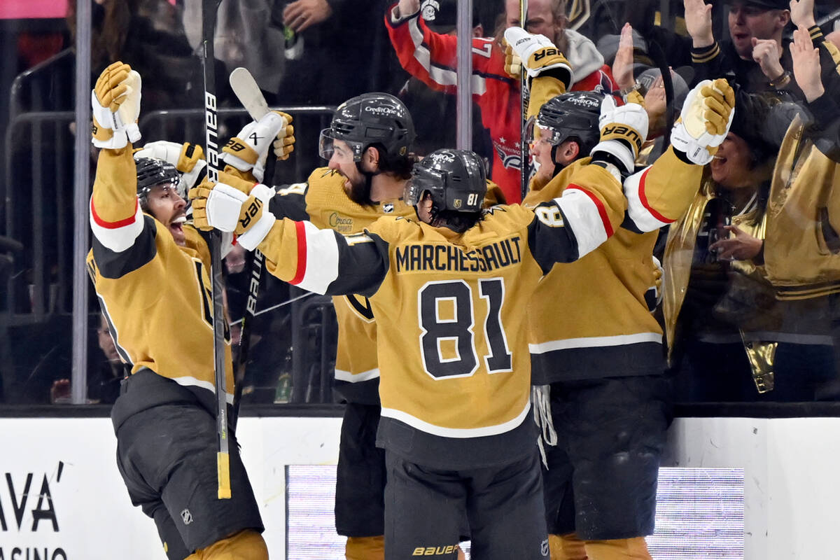 The Vegas Golden Knights celebrate center Jack Eichel's goal against the Dallas Stars during th ...