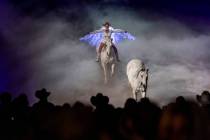 Trick and Roman rider Jessica Fowlkes follows a horse about a smoke-filled ring during a memori ...