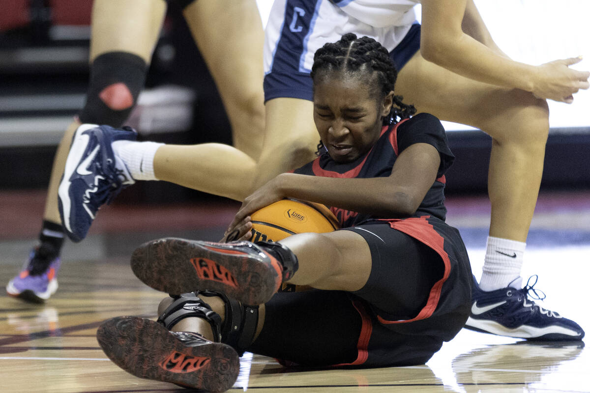 Coronado’s Jaila Childress dives for the ball during the second half of a Class 5A girls ...