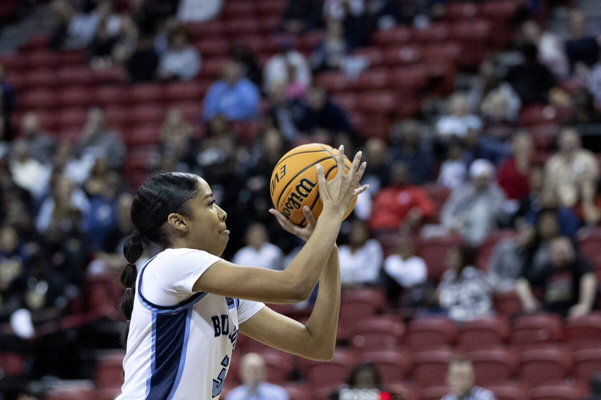 Centennial’s Charlece Ohiaeri attempts a three-pointer during the first half of a Class ...