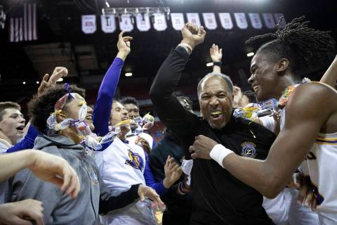 Durango coach Mike Lee, second from right, joins his team’s celebration including star p ...