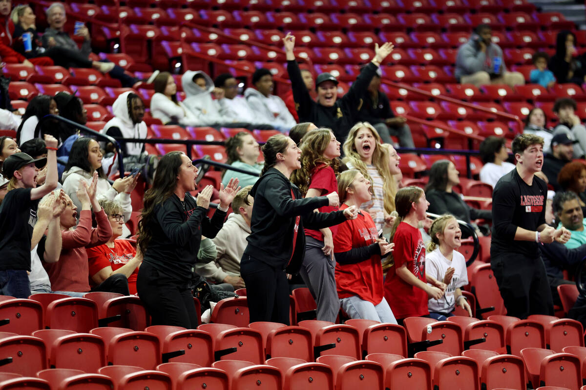 Fans react during the class 4A girls high school basketball state championship game between Las ...