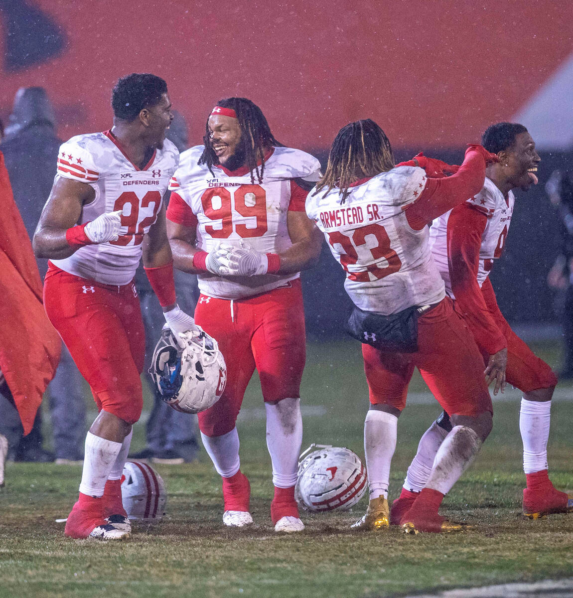 DC Defenders, from left, Malike Fisher (92), Joe Wallace (99), Ryquell Armstead (23) and K.J. S ...