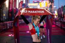 Ellie Stevens, of Las Vegas, reacts after winning the women’s Rock ‘n’ Rol ...