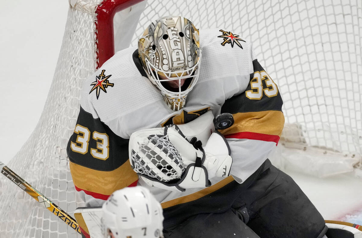 Vegas Golden Knights goaltender Adin Hill stops a shot in the first period of an NHL hockey gam ...