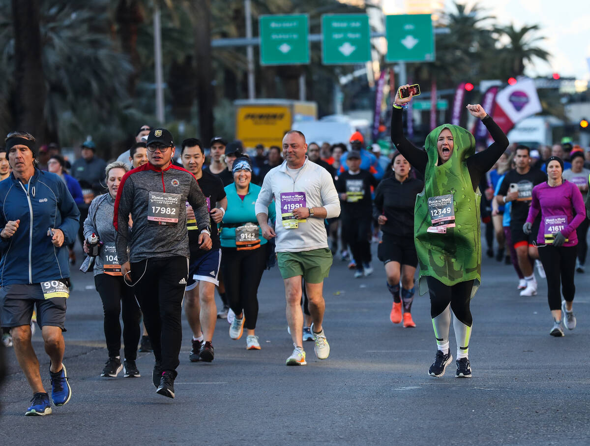 Runners race in the Rock ’n’ Roll Running Series Racing Event on the Strip in Las ...