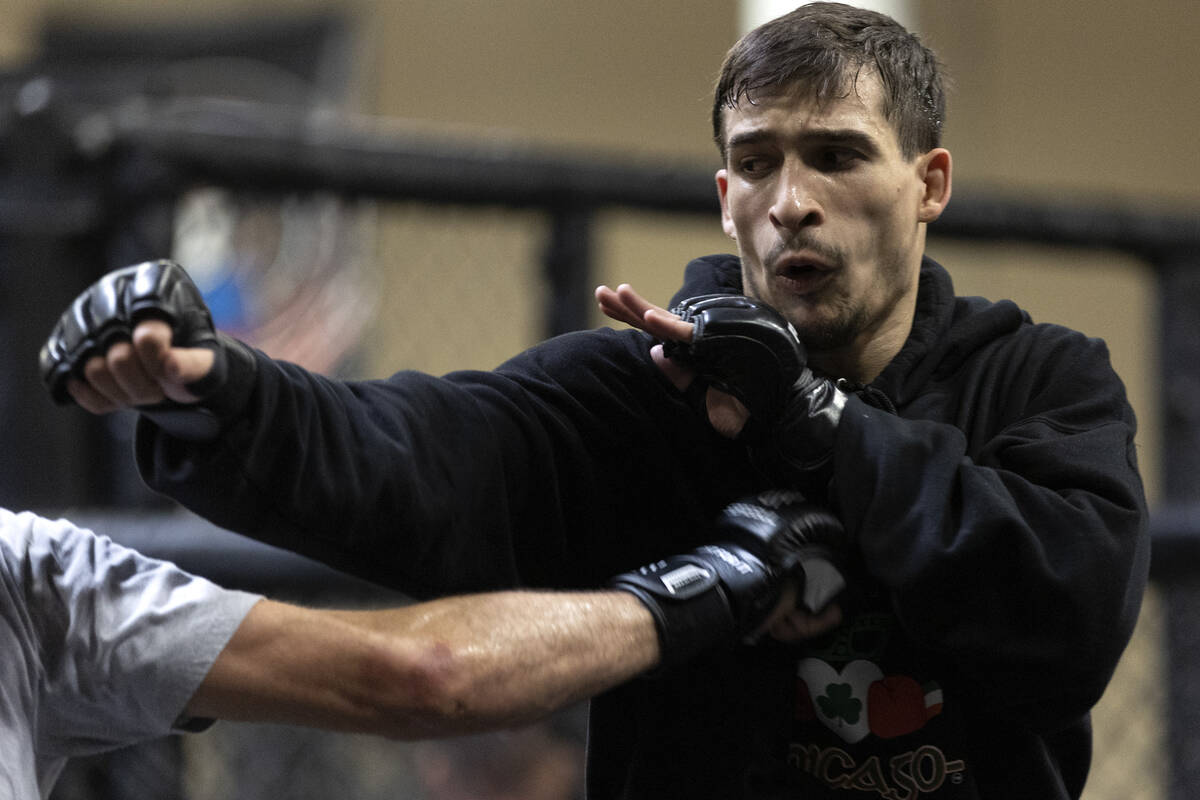 MMA fighter Biaggio Ali Walsh, grandson of legendary boxer Muhammad Ali, spars during training ...