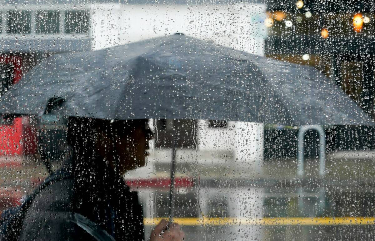 Rain collects on a windowpane in Oakland, Calif., Monday, Feb. 27, 2023. (AP Photo/Godofredo A. ...