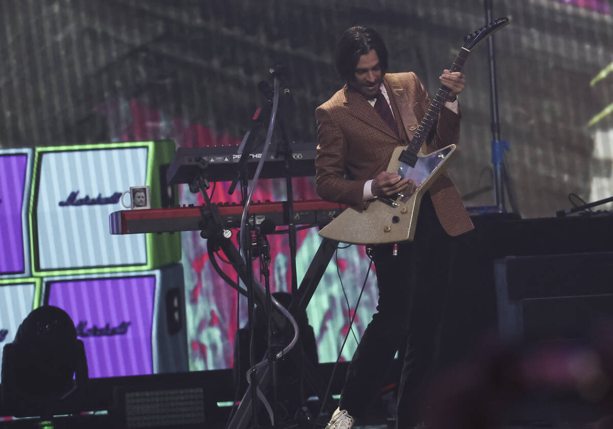 Brian Bell of Weezer performs following the first round of the NFL draft on Thursday, April 28, ...