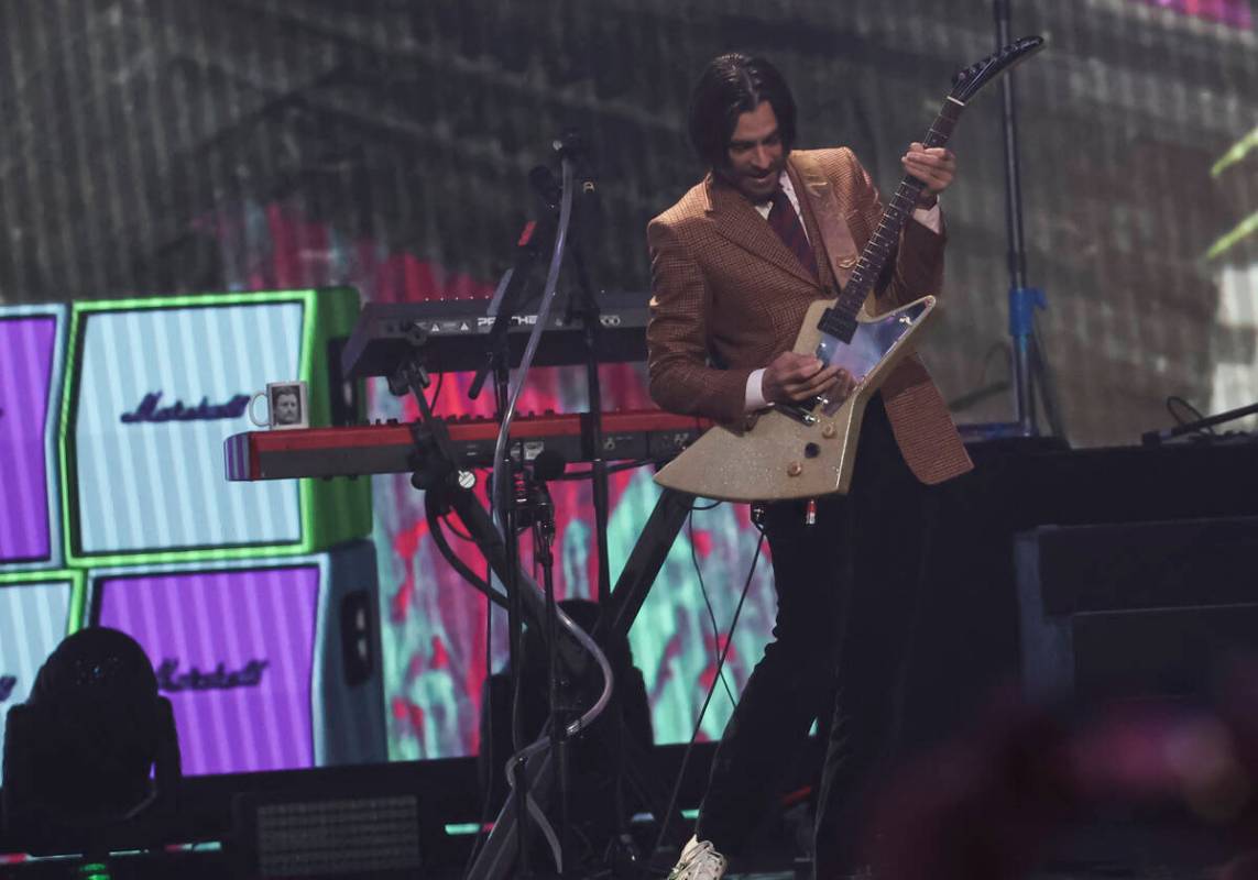 Brian Bell of Weezer performs following the first round of the NFL draft on Thursday, April 28, ...