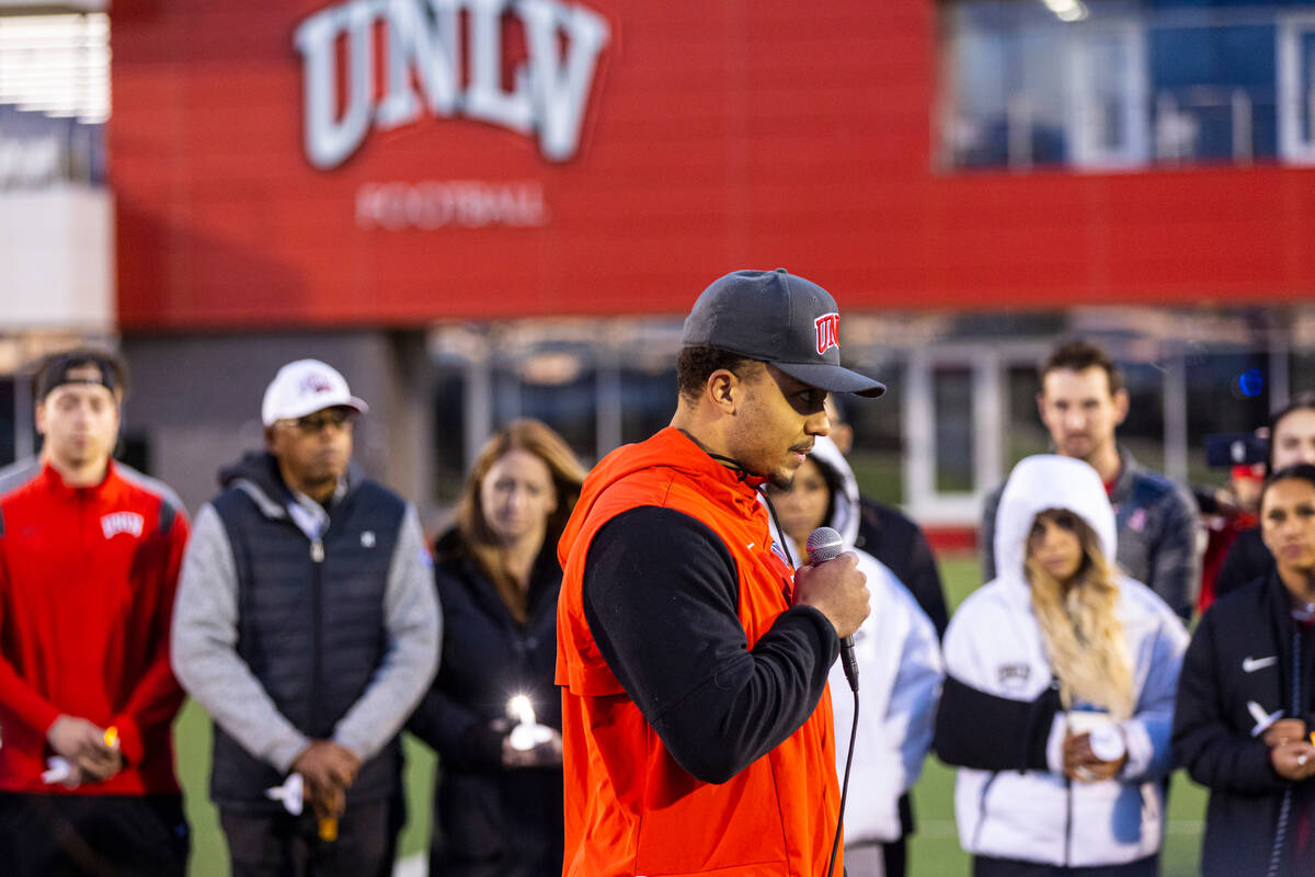 UNLV outside linebacker Elijah Shelton speaks during a vigil in memory of UNLV football player ...