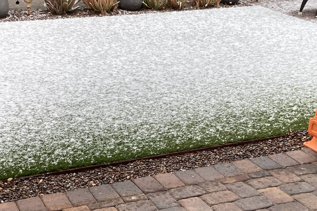 Snow accumulates outside a Summerlin home Wednesday, March 1, 2023, in Las Vegas. (Eli Segall/L ...