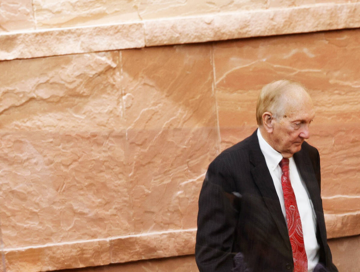 Deputy County Manager Jeff Wells walks back to a meeting of the Clark County Commission after s ...