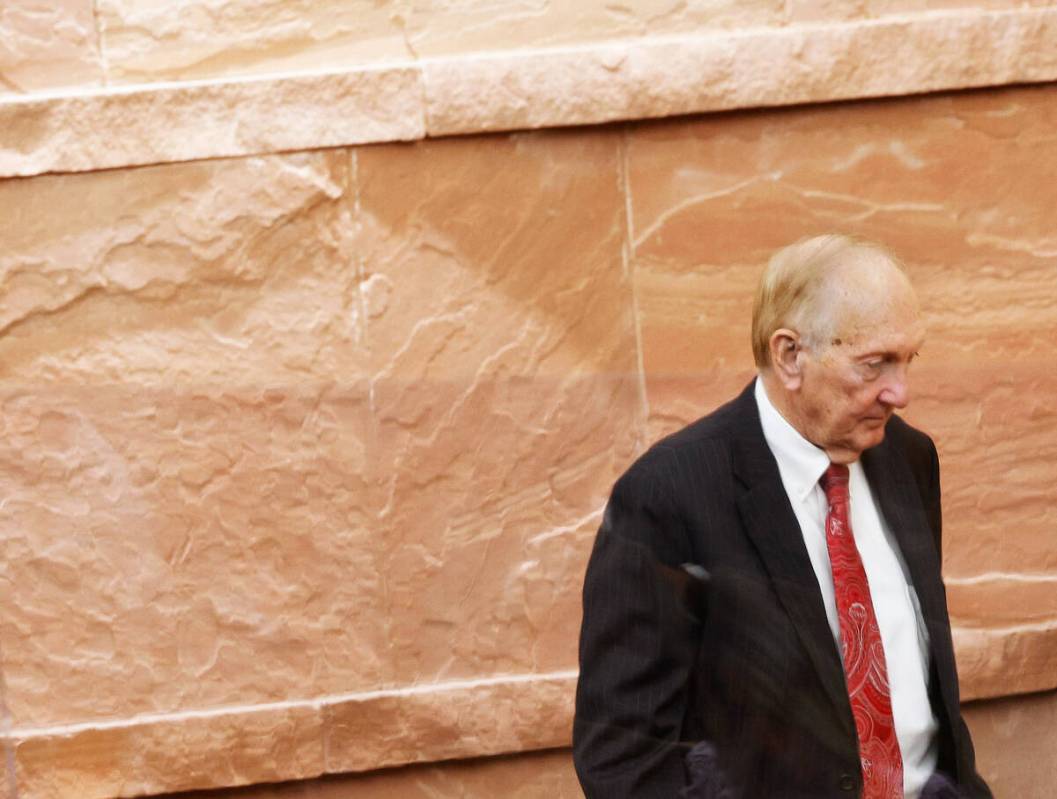Deputy County Manager Jeff Wells walks back to a meeting of the Clark County Commission after s ...