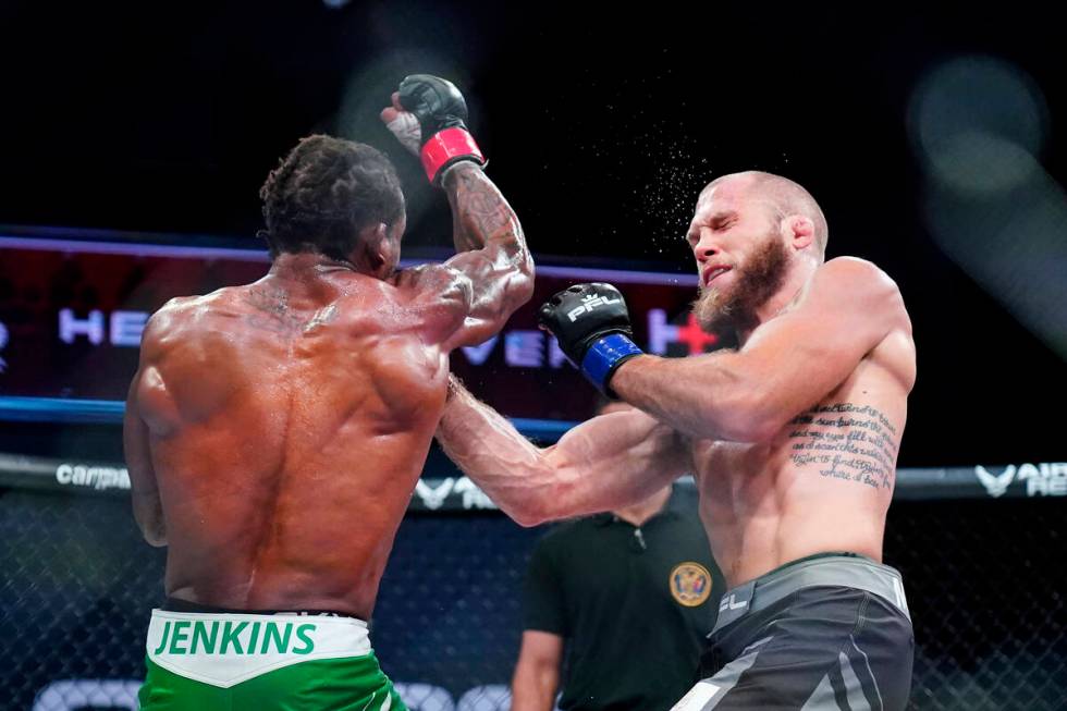Bubba Jenkins, left, and Bobby Moffett trade punches during a Professional Fighters League mixe ...