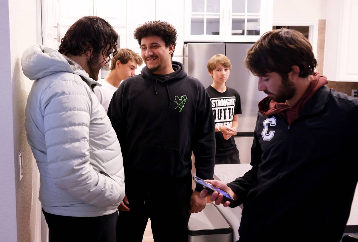 Program staff members, including from left, Osvaldo Nares, 23, Hayden Huckfelt, 22, and Cole Br ...