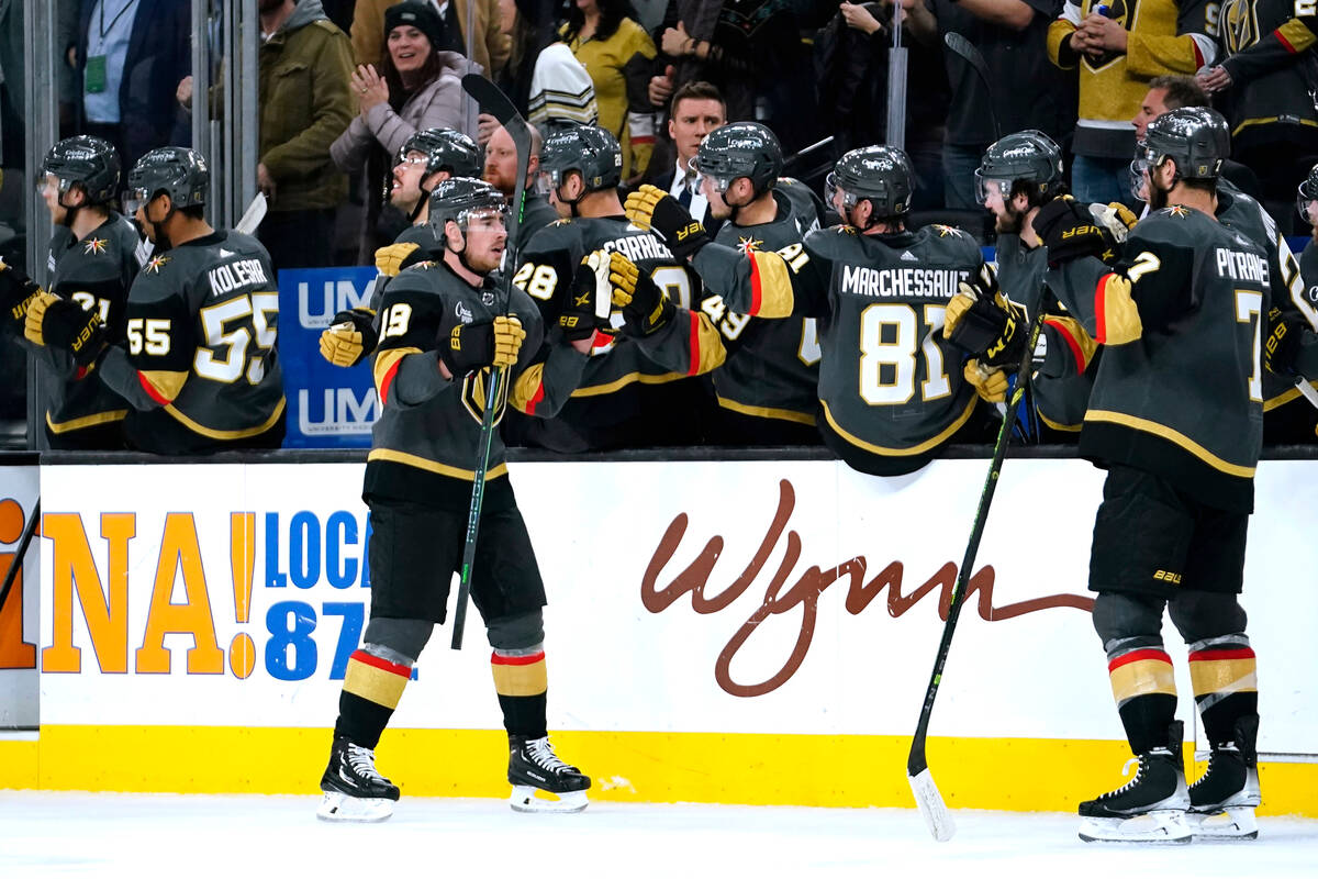 Vegas Golden Knights right wing Reilly Smith (19) is congratulated for his goal against the Car ...