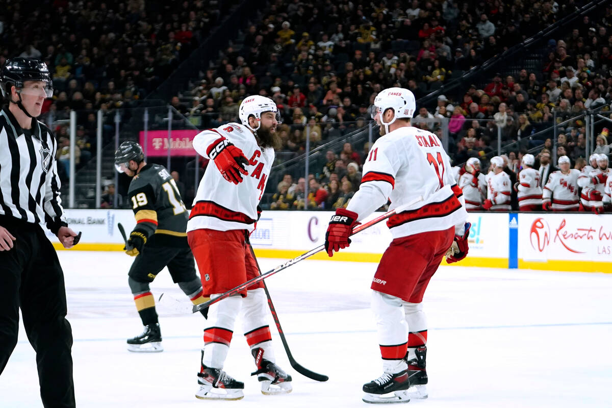 Aho's 1st hat trick helps Hurricanes beat Flyers to end skid