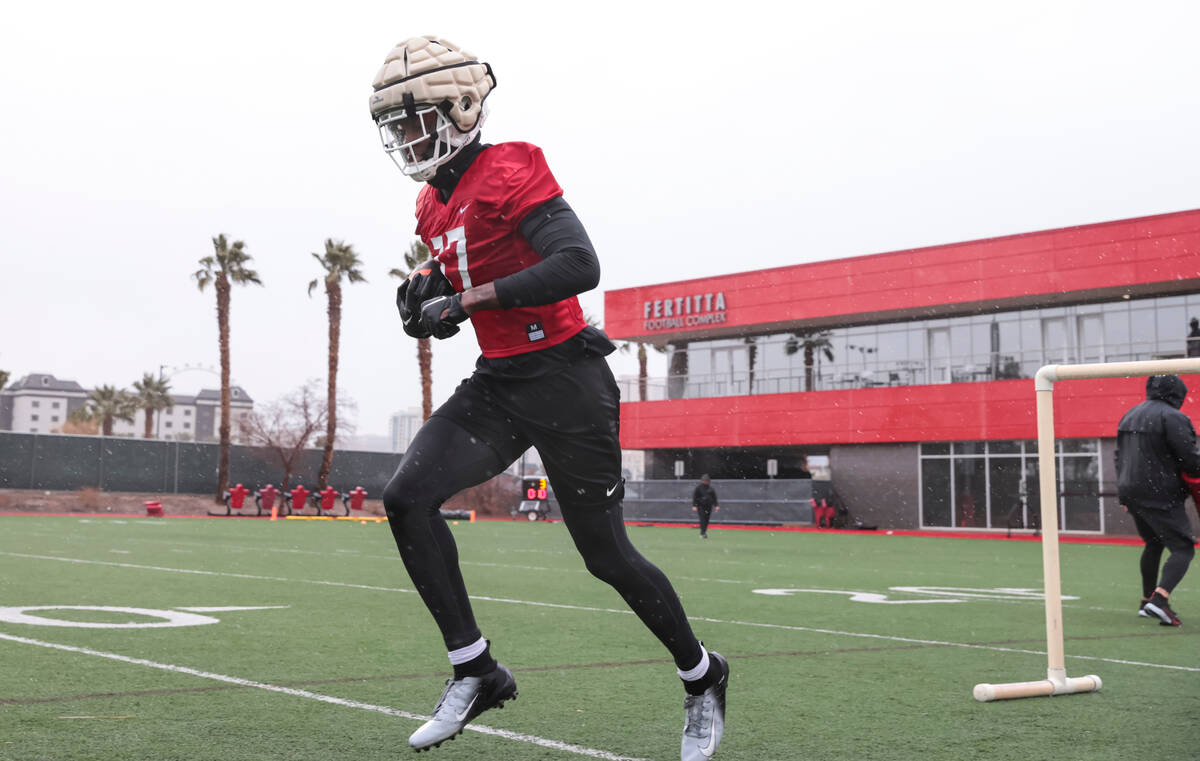 UNLV wide receiver Jordan Jakes (17) participates in drills during the first day of spring foot ...