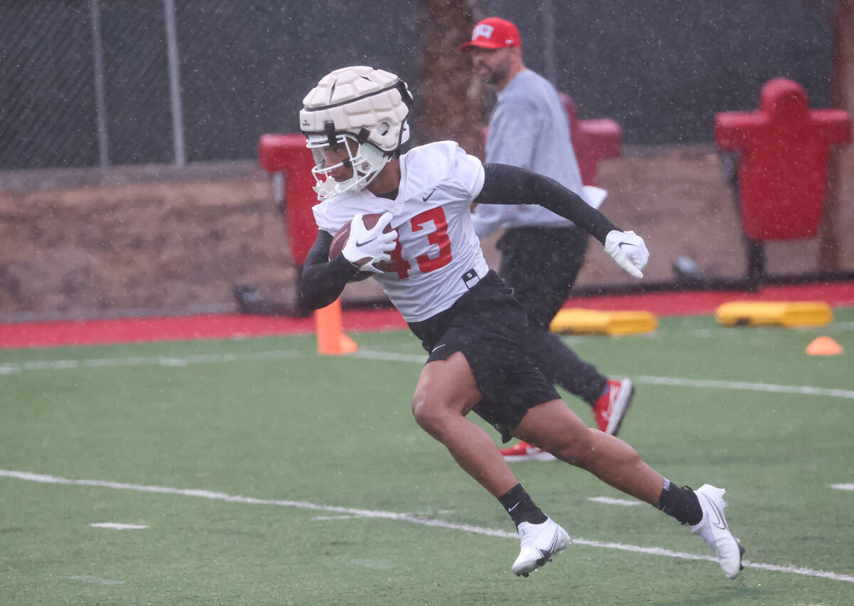 UNLV defensive back Mekhi Mercer runs the ball during the first day of spring football practice ...