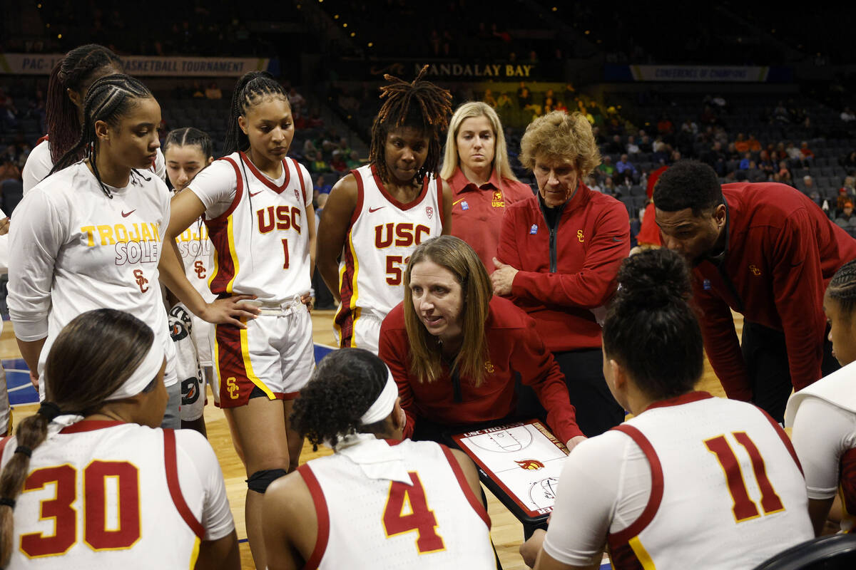 USC Trojans head coach Lindsay Gottlieb talks to her players including USC Trojans guard Taylor ...
